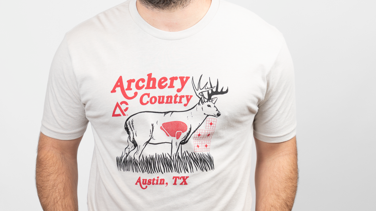 A bowhunter preparing archery gear for Texas deer season at Archery Country