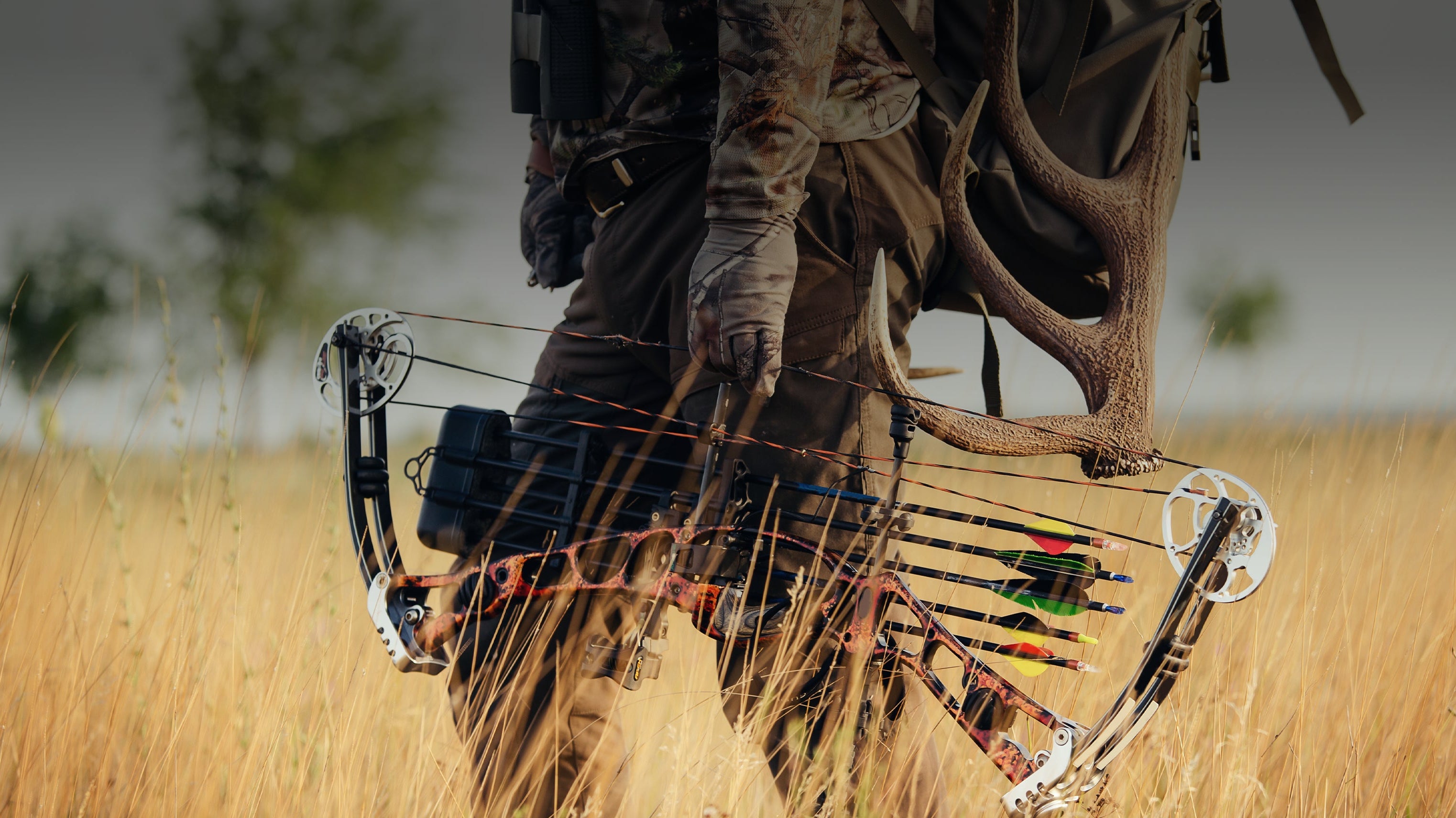 A first-time archer drawing a bow on Archery Country's indoor range in Austin