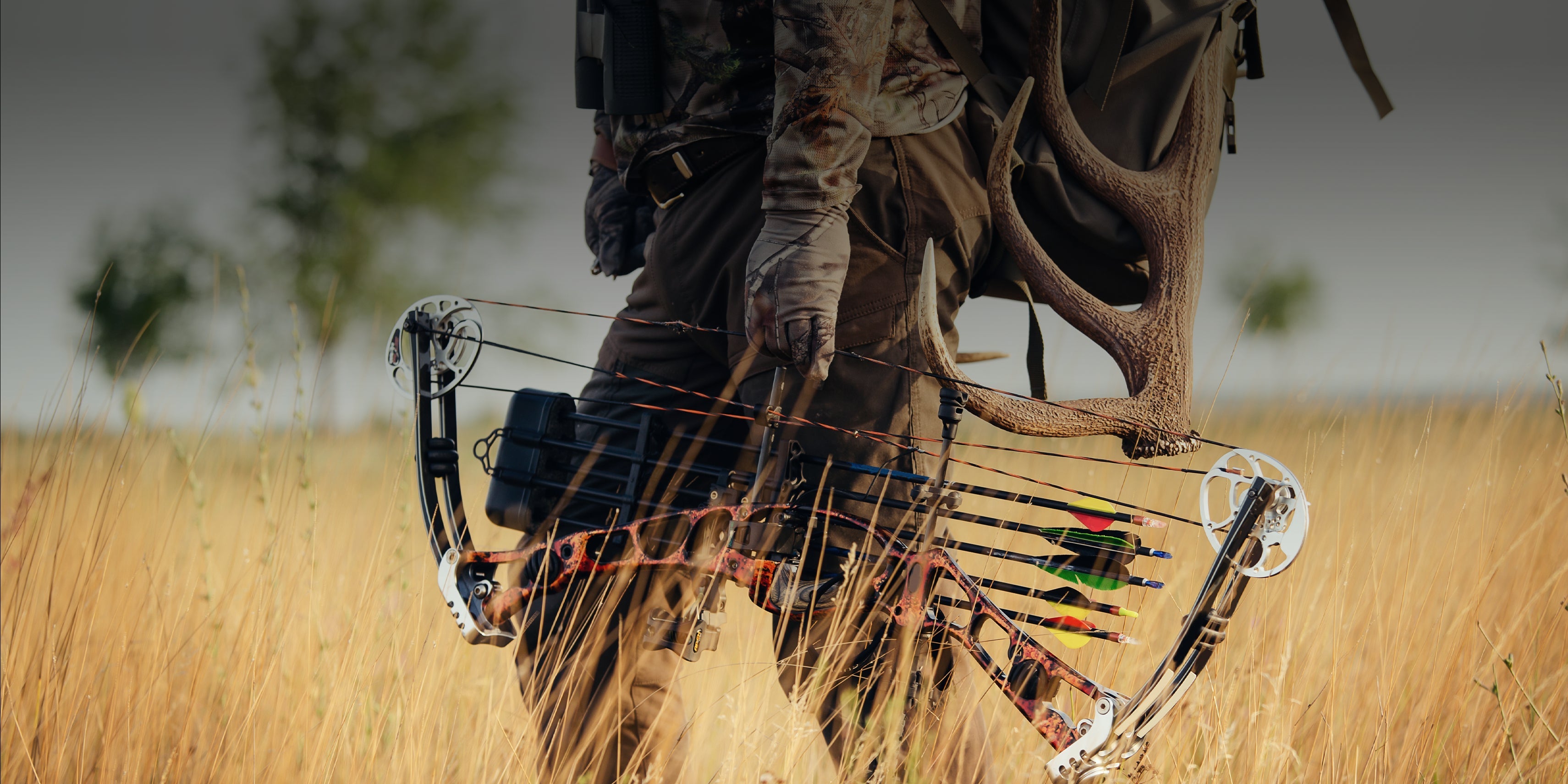 A first-time archer drawing a bow on Archery Country's indoor range in Austin