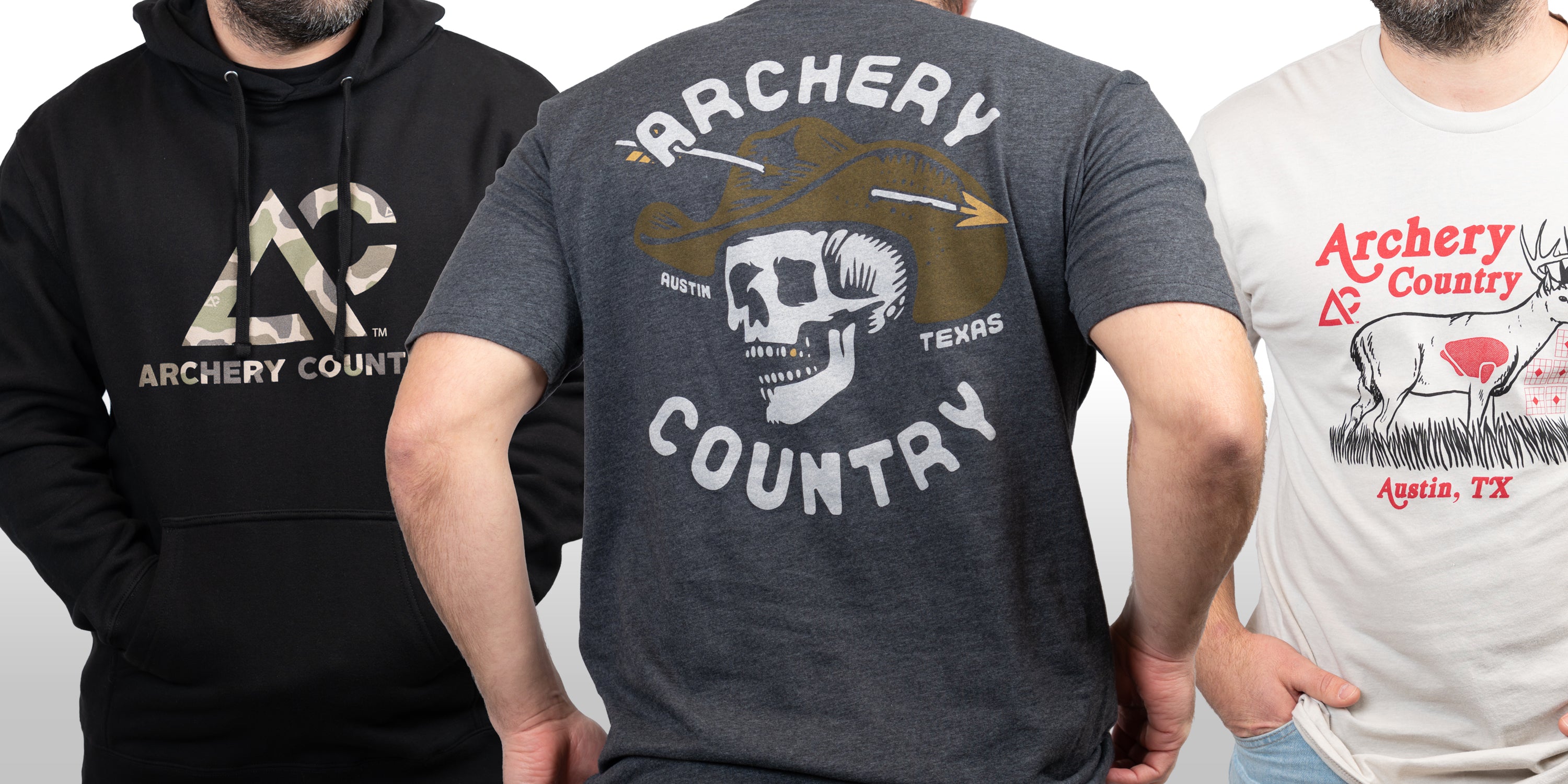 Man and woman wearing Archery Country hoodies and hats while browsing the archery shop's apparel collection.